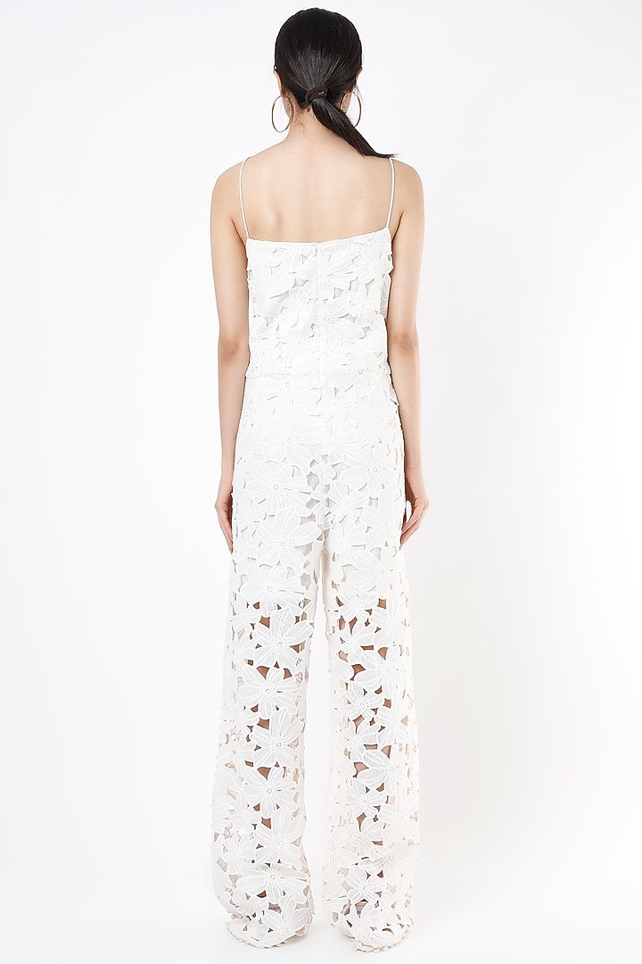 White Pom-Pom Laced Jumpsuit by Mia Magell at Pernia's Pop Up Shop