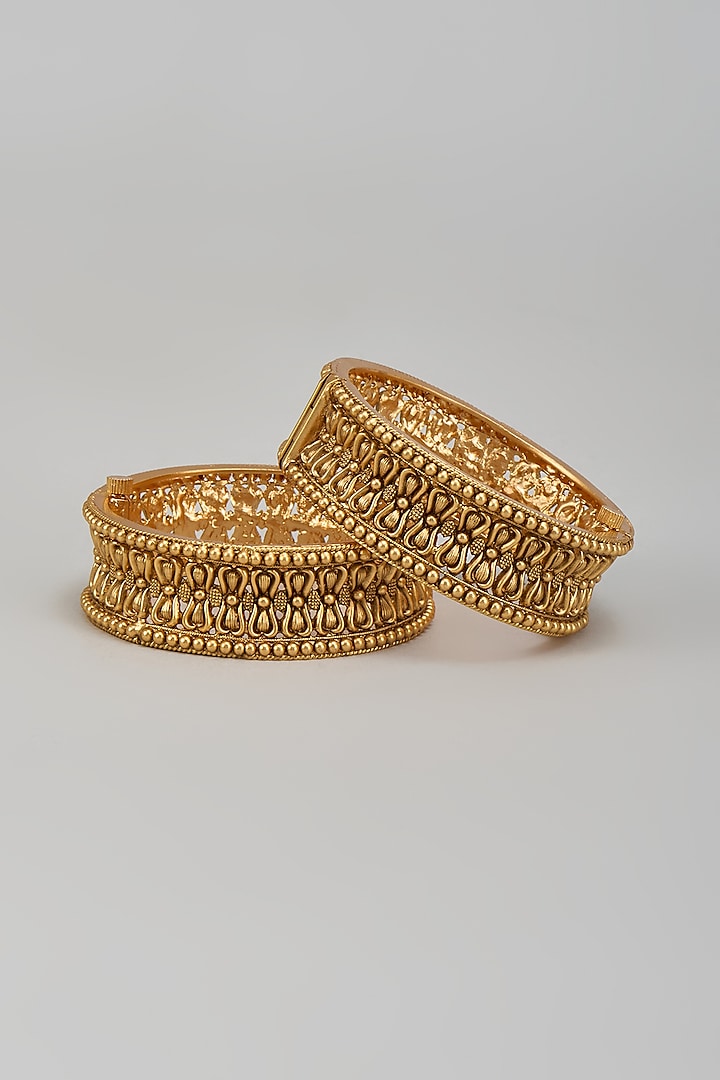 Gold Finish Temple Bracelets (Set Of 2) by Minaki