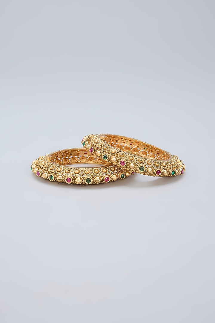 Gold Finish Ruby & Emerald Kemp Stone Kadas (Set Of 2) by Minaki at Pernia's Pop Up Shop