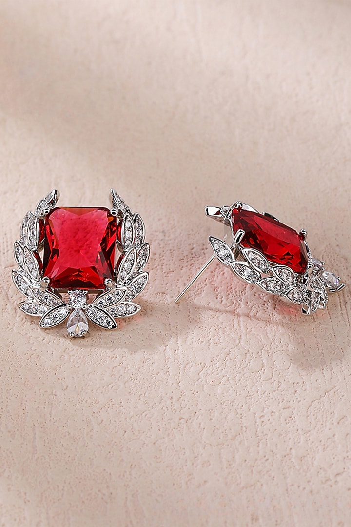 White Gold Finish Cubic Zirconia & Ruby Stone Stud Earrings by Minaki at Pernia's Pop Up Shop