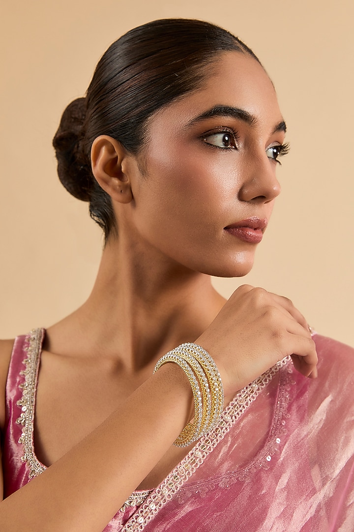 Gold Plated Cubic Zirconia Bangles (Set Of 4) by Minaki at Pernia's Pop Up Shop