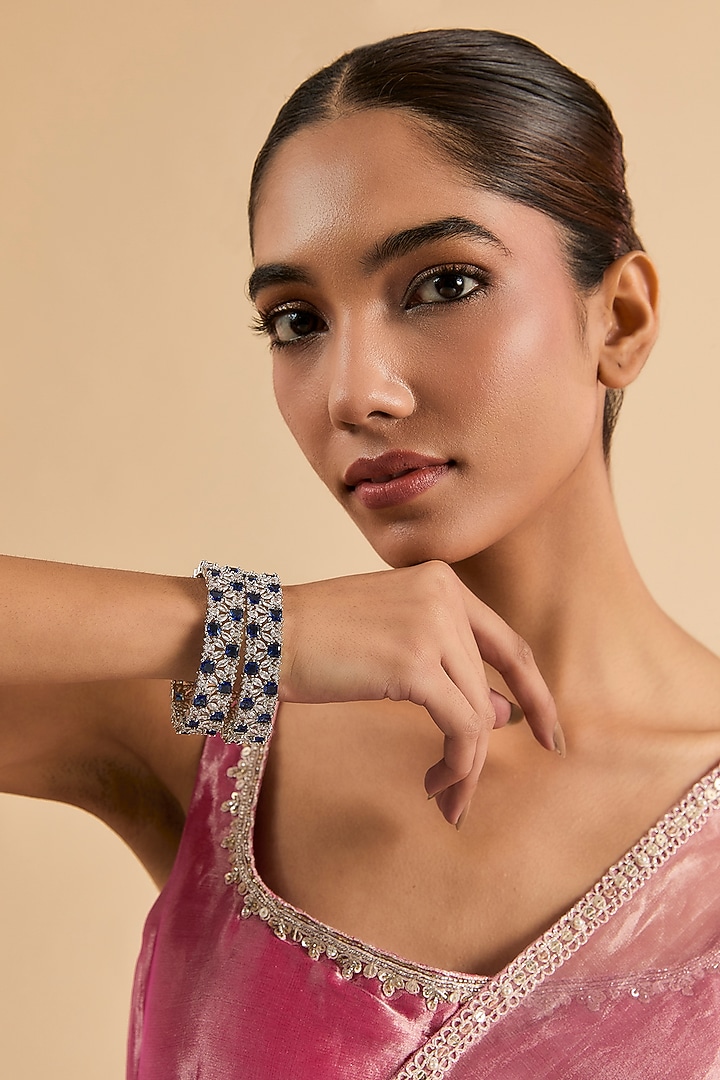 White Gold Finish Blue Zircon Bracelets (Set Of 2) by Minaki at Pernia's Pop Up Shop