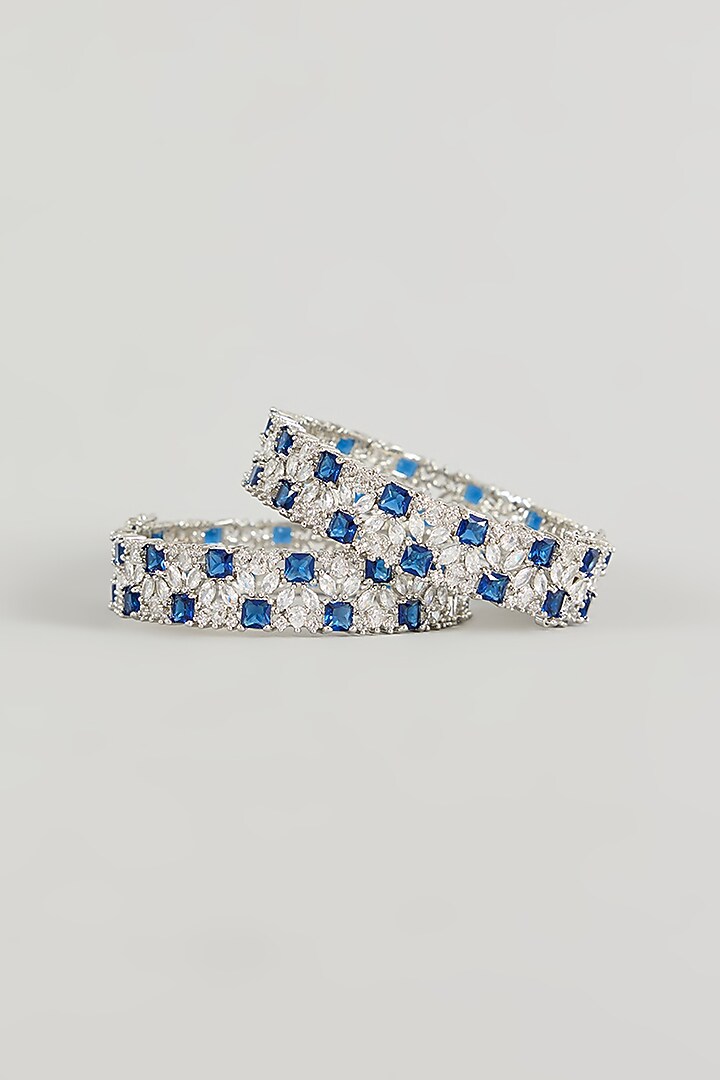 White Gold Finish Blue Zircon Bracelets (Set Of 2) by Minaki at Pernia's Pop Up Shop
