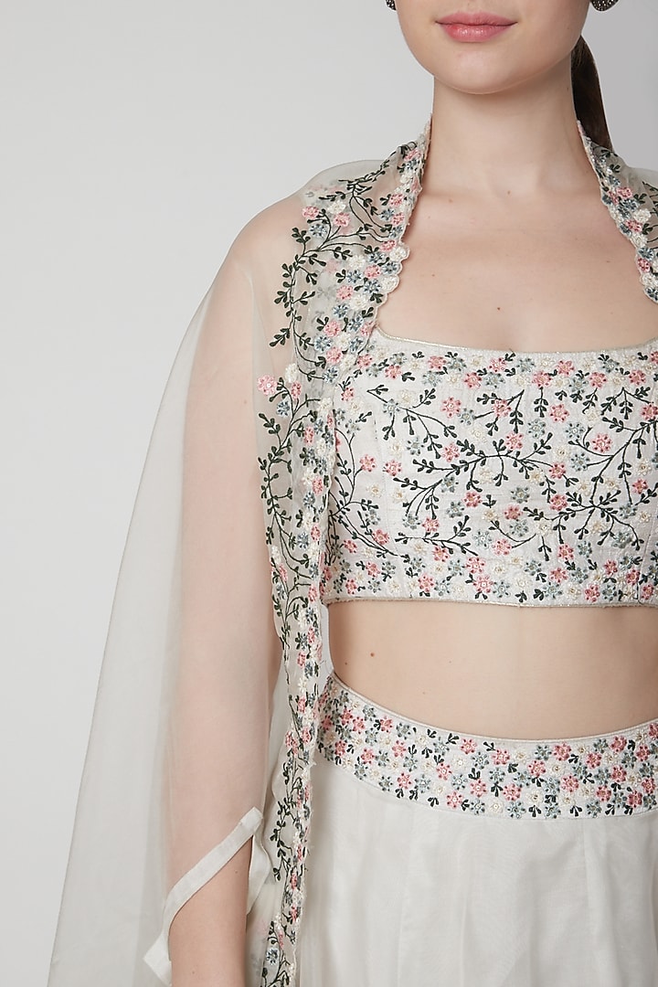 White Embroidered Cape & Skirt Set by Mint Blush at Pernia's Pop Up Shop