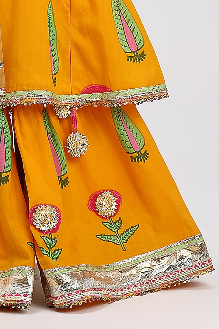 Haldi Yellow Cotton Block Printed Kurta Set For Girls by MINIME ORGANICS at Pernia's Pop Up Shop