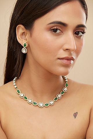 Gold Rhodium Plated Green Stone & Moissanite Polki Dangler Earrings In Sterling Silver by Mirelle