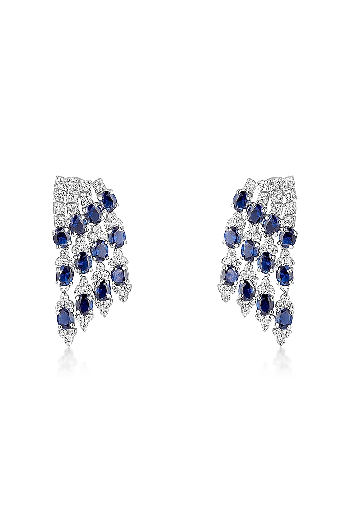 White Finish Cubic Zirconia & Blue Sapphire Dangler Earrings In Sterling Silver by Mirelle at Pernia's Pop Up Shop