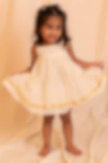 Cream Handloom Cotton Embellished Dress For Girls by Mirali