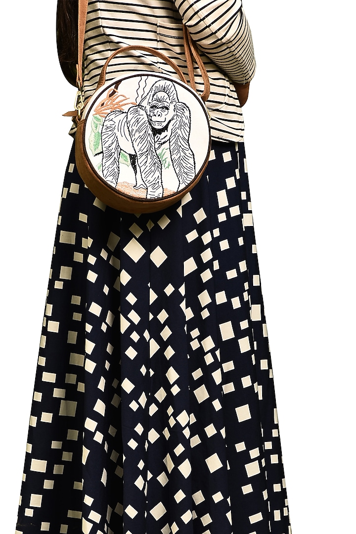 White & Olive Green Embroidered Round Sling Bag by Mixmitti at Pernia's Pop Up Shop