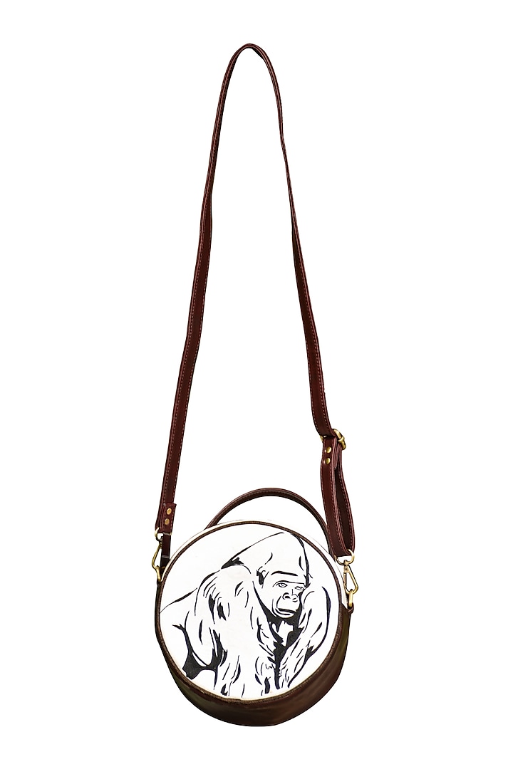 Brown & White Embroidered Round Sling Bag by Mixmitti