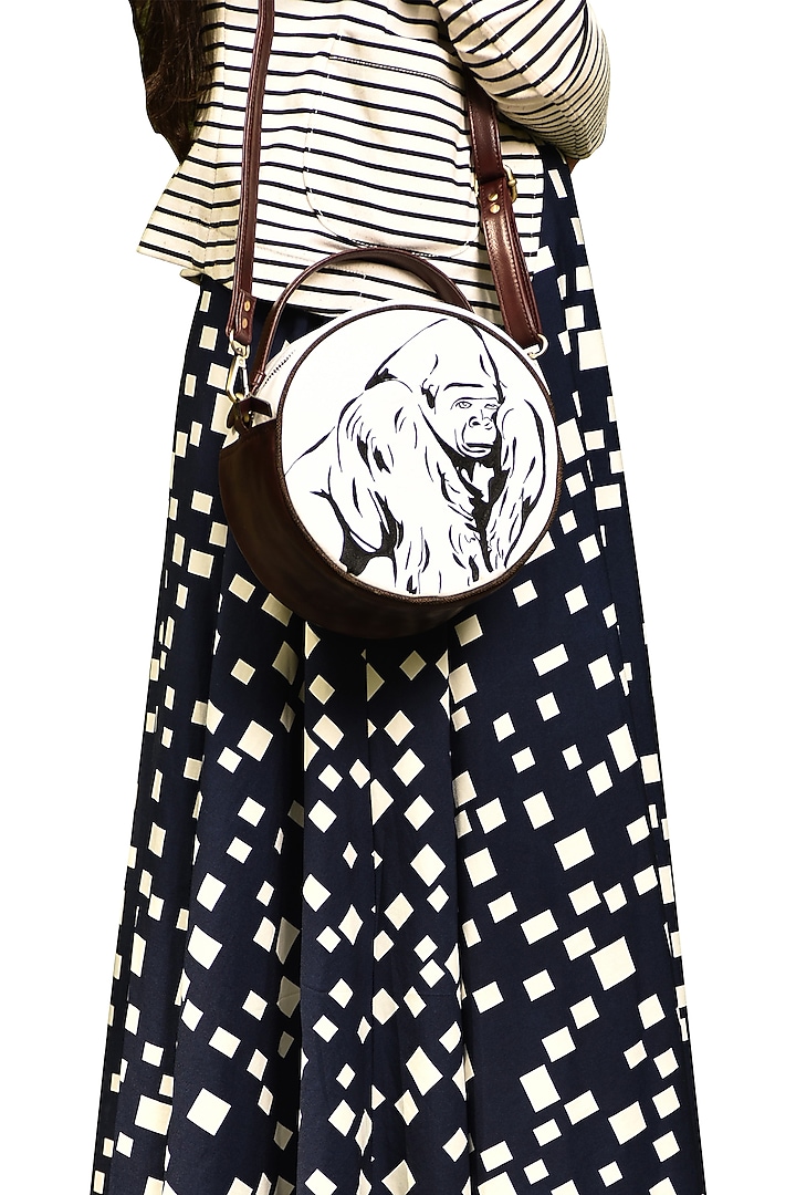 Brown & White Embroidered Round Sling Bag by Mixmitti at Pernia's Pop Up Shop