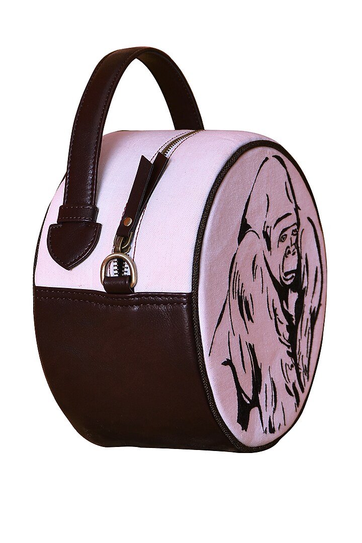 Brown & White Embroidered Round Sling Bag by Mixmitti at Pernia's Pop Up Shop