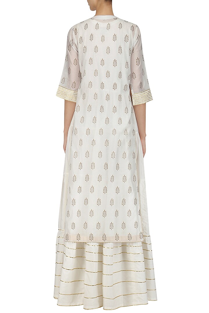 White tiered maxi dress and foil print kurta set available only at Pernia's Pop Up Shop.