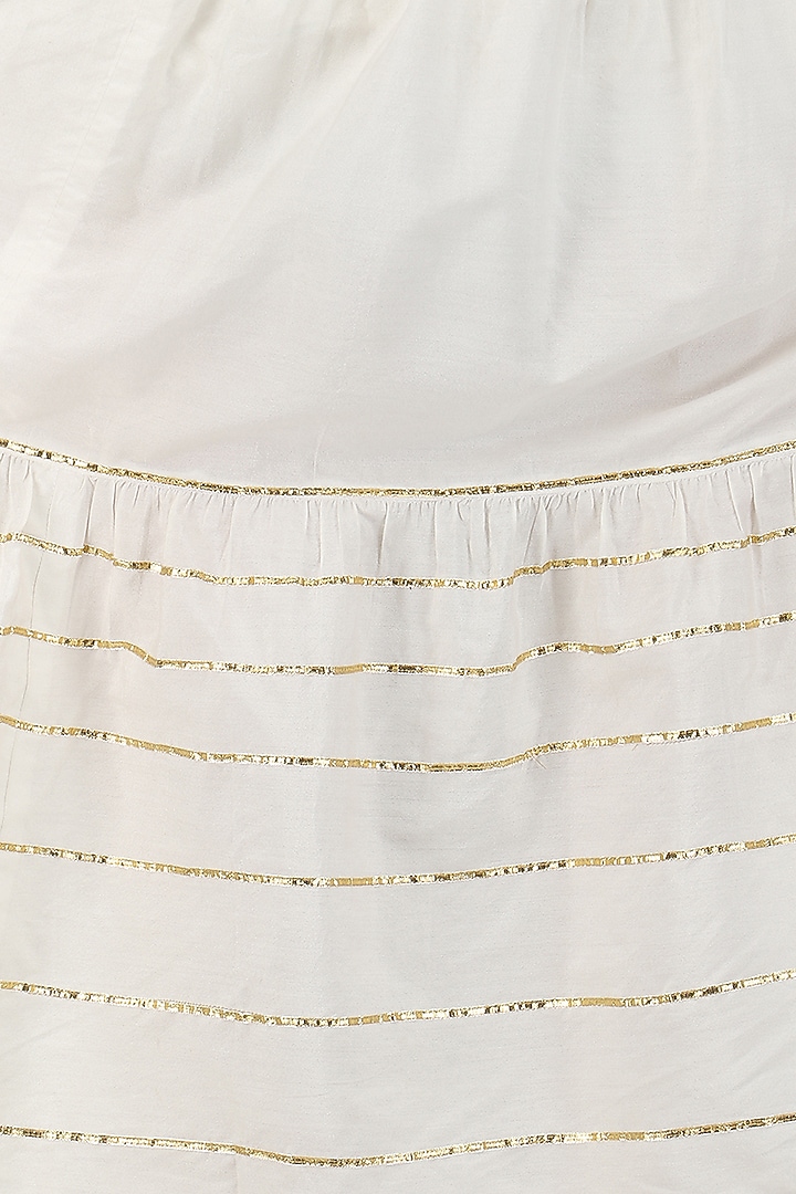 White tiered maxi dress and foil print kurta set available only at Pernia's Pop Up Shop.