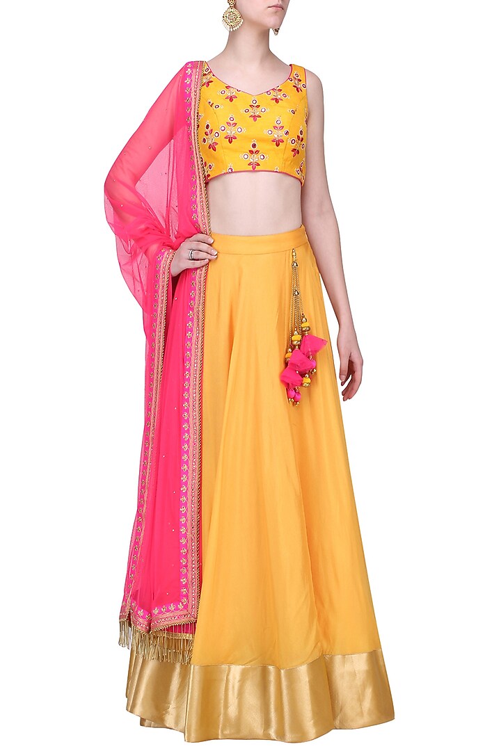 Mustard and pink embroidered Lehenga set available only at Pernia's Pop Up Shop.