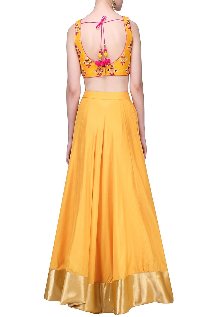 Mustard and pink embroidered Lehenga set available only at Pernia's Pop Up Shop.