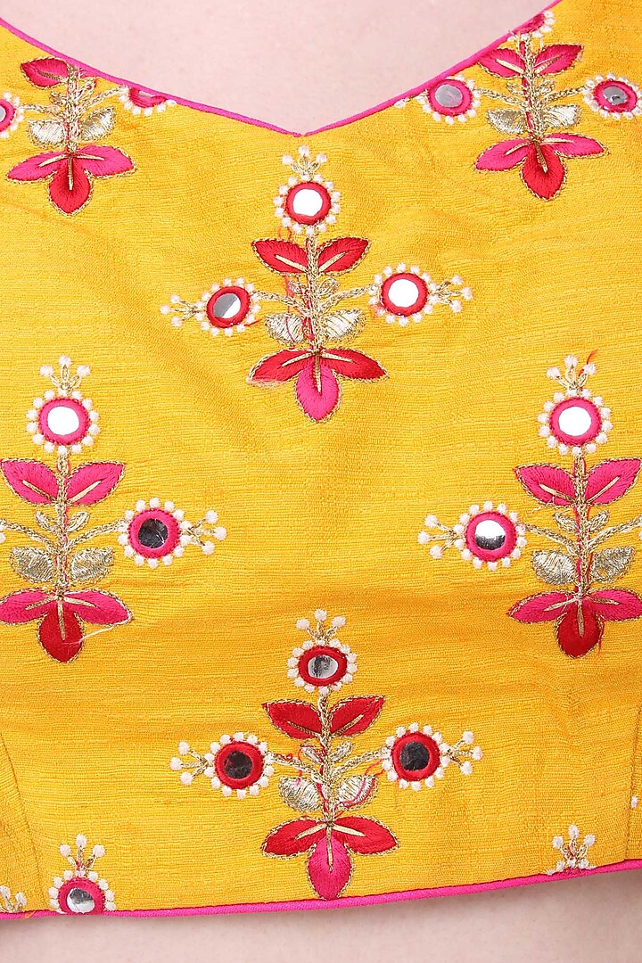 Mustard and pink embroidered Lehenga set available only at Pernia's Pop Up Shop.