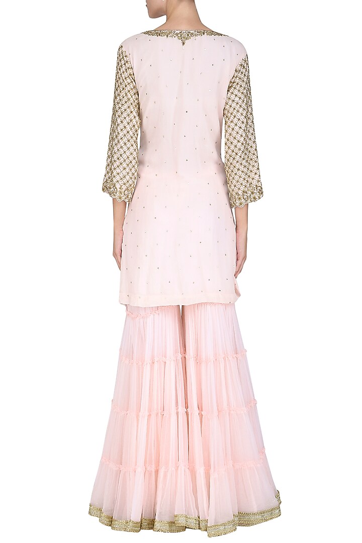 Baby pink embroidered kurta with gharara pants set available only at Pernia's Pop Up Shop.
