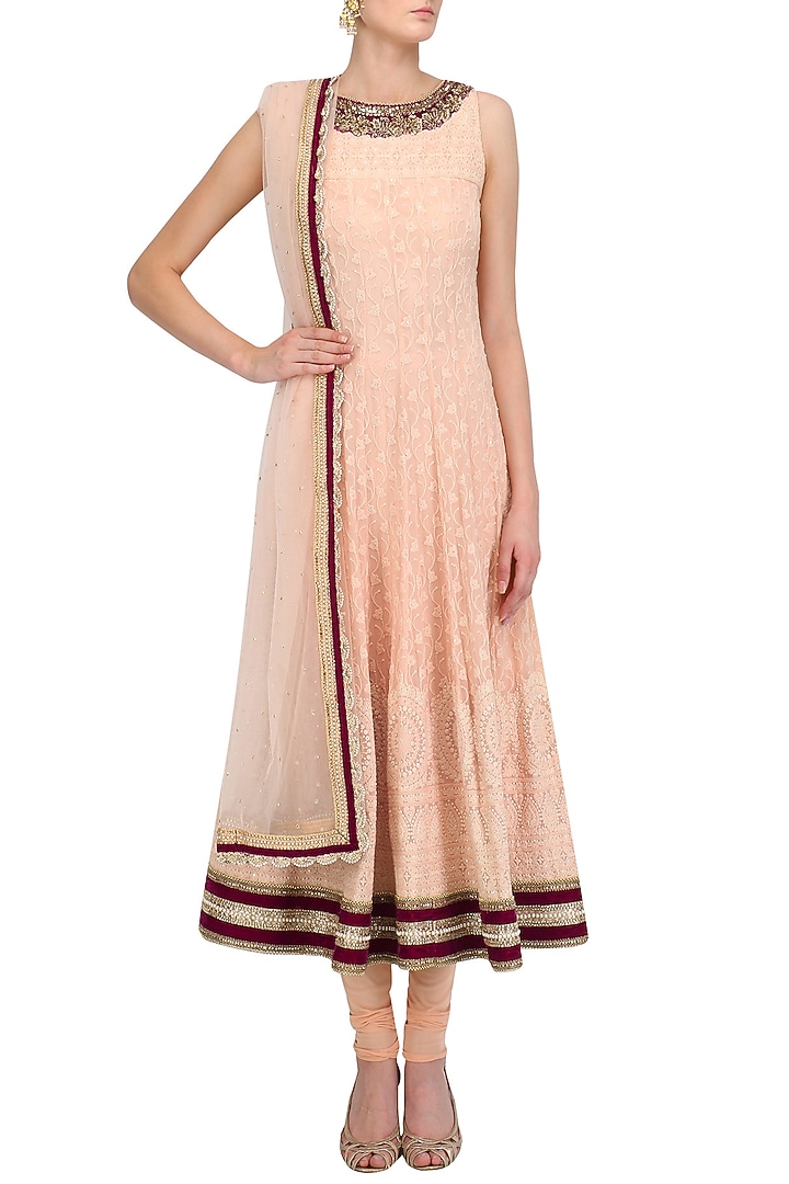 Peach and wine lakhnavi anarkali set available only at Pernia's Pop Up Shop.