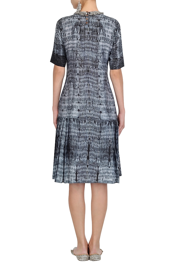 Black and white pleated dress available only at Pernia's Pop Up Shop.