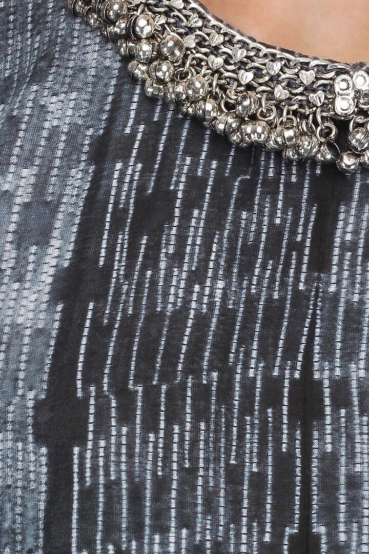 Black and white pleated dress available only at Pernia's Pop Up Shop.