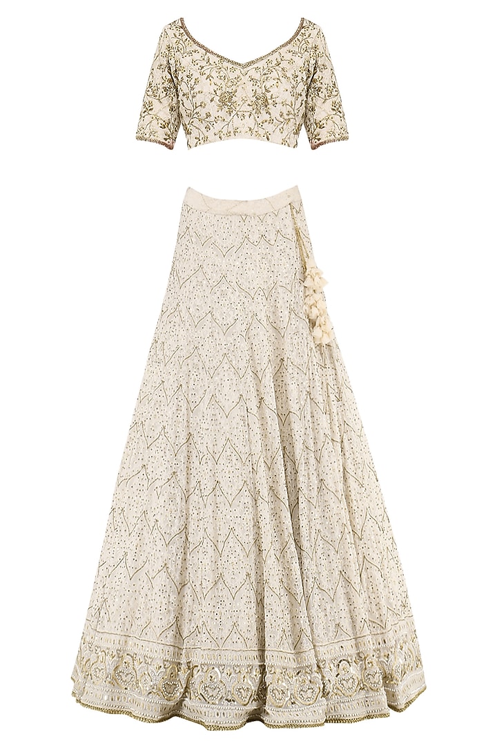 Ivory embroidered lucknavi lehenga set available only at Pernia's Pop Up Shop.