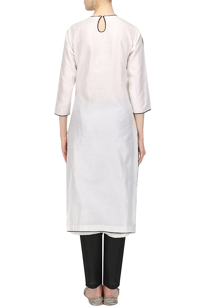 White hand paint kurta and trouser set available only at Pernia's Pop Up Shop.