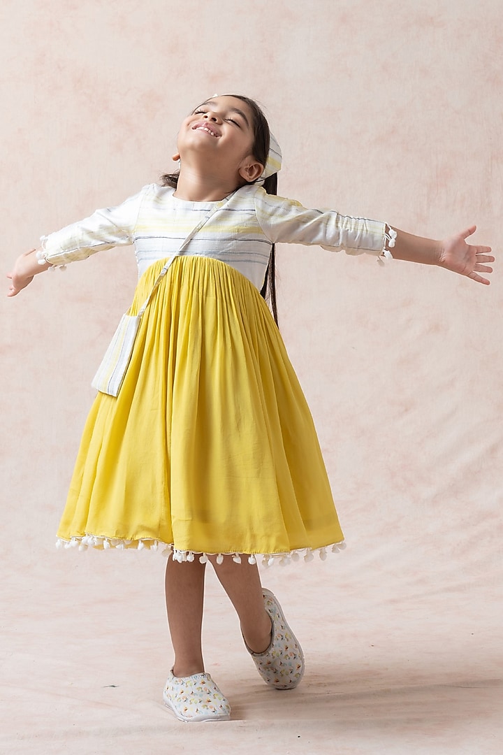 Yellow Pure Dupion Silk Gathered Dress For Girls by Thetaa Kids at Pernia's Pop Up Shop