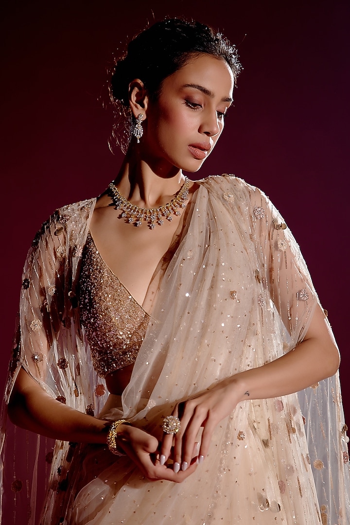 Sunvillea Cream Shimmer Chiffon Embroidered Bridal Lehenga Saree Set by Monika Nidhee at Pernia's Pop Up Shop