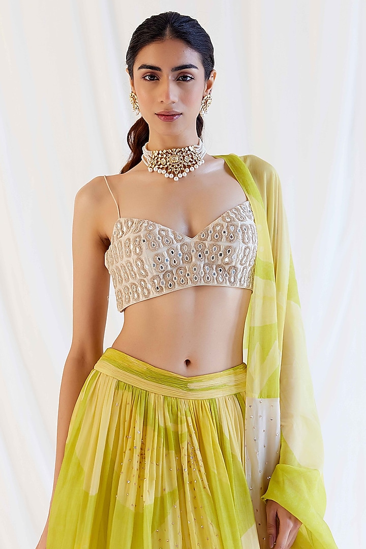 Sunvillea Cream Organza Floral Printed & Mirror Embroidered Wedding Lehenga Set by Monika Nidhee at Pernia's Pop Up Shop