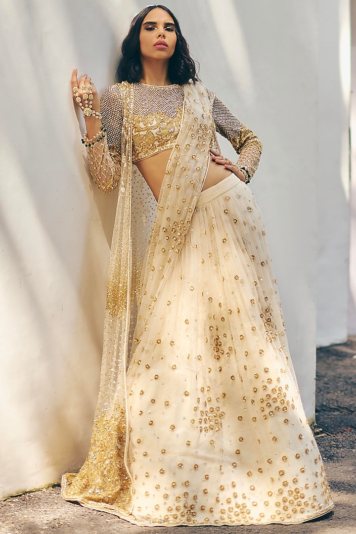 Ivory Organza Gold & Sequins Embroidered Bridal Lehenga Set by Monika Nidhii at Pernia's Pop Up Shop