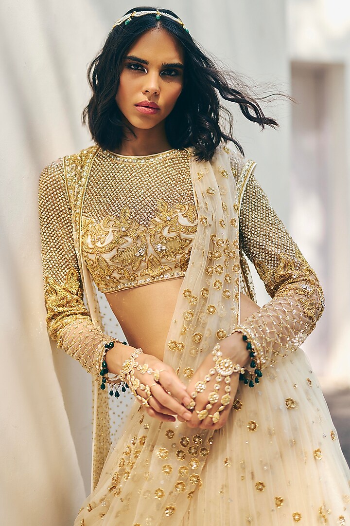 Ivory Organza Gold & Sequins Embroidered Bridal Lehenga Set by Monika Nidhee at Pernia's Pop Up Shop