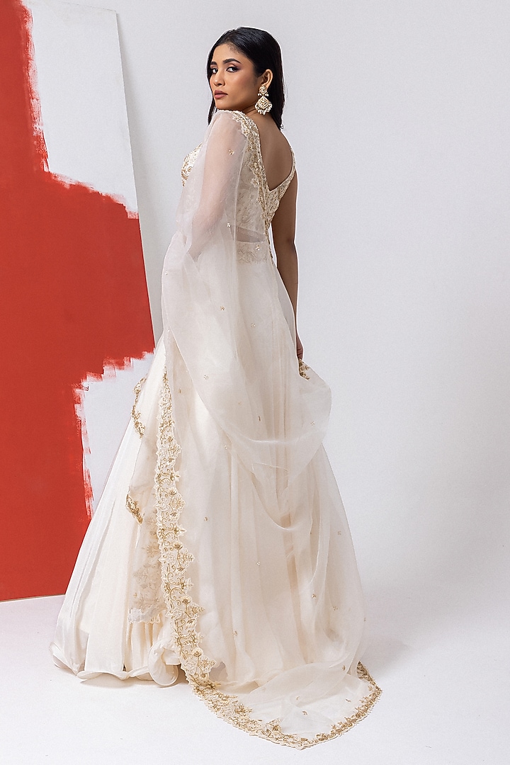 Ivory Organza & Crepe Pearl Work Wedding Lehenga Set by Mehak Sharma at Pernia's Pop Up Shop