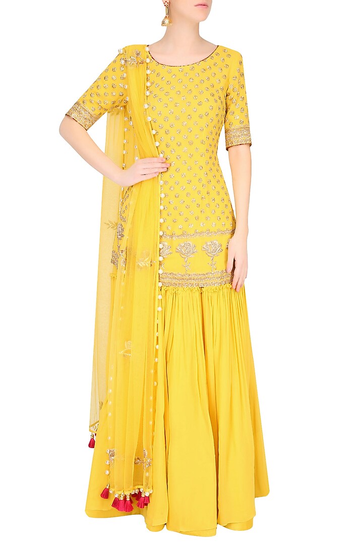 Buttercup color floral motifs short kurta and sharara pants set available only at Pernia's Pop Up Shop.