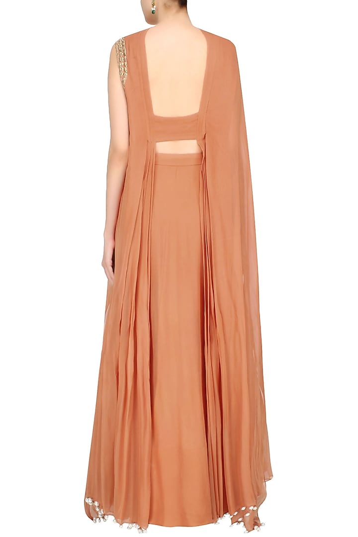 Iced coffee color floral cutwork one sleeve cape and orange skirt set available only at Pernia's Pop Up Shop.