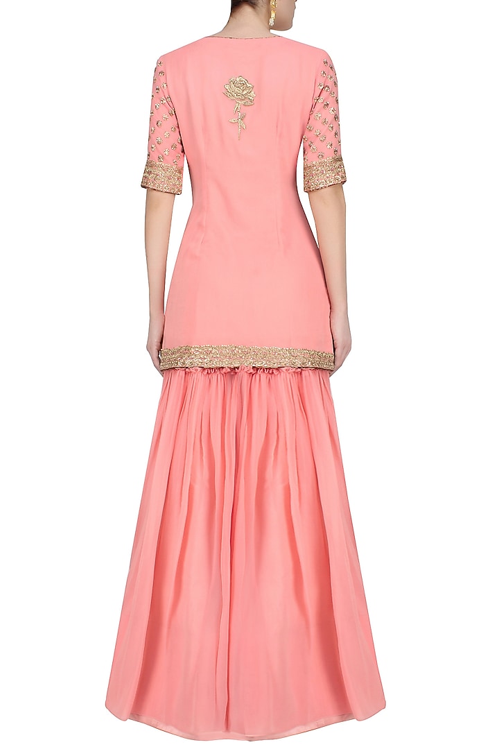 Pink floral embroidered motifs short kurta and sharara skirt set available only at Pernia's Pop Up Shop.