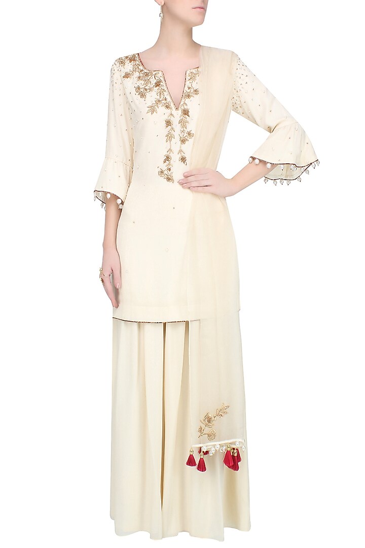 Ivory and gold embroidered motifs short kurta and pants set available only at Pernia's Pop Up Shop.