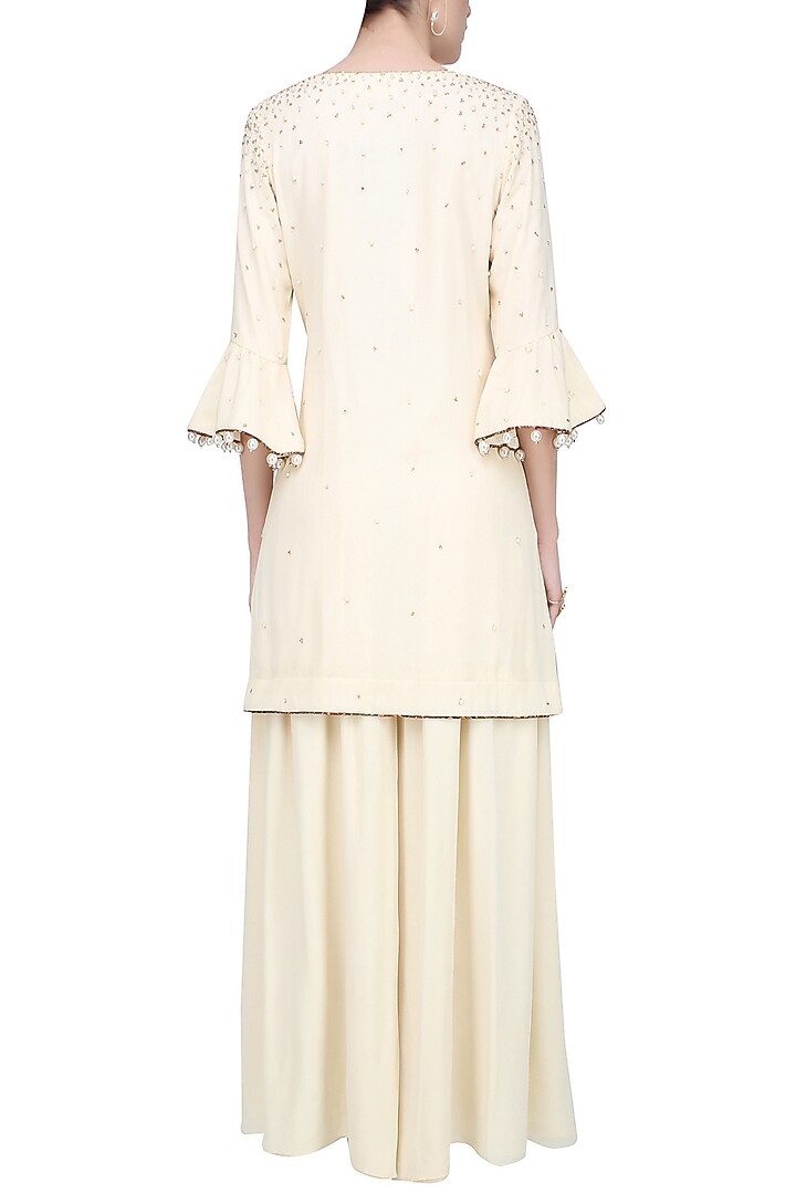 Ivory and gold embroidered motifs short kurta and pants set available only at Pernia's Pop Up Shop.