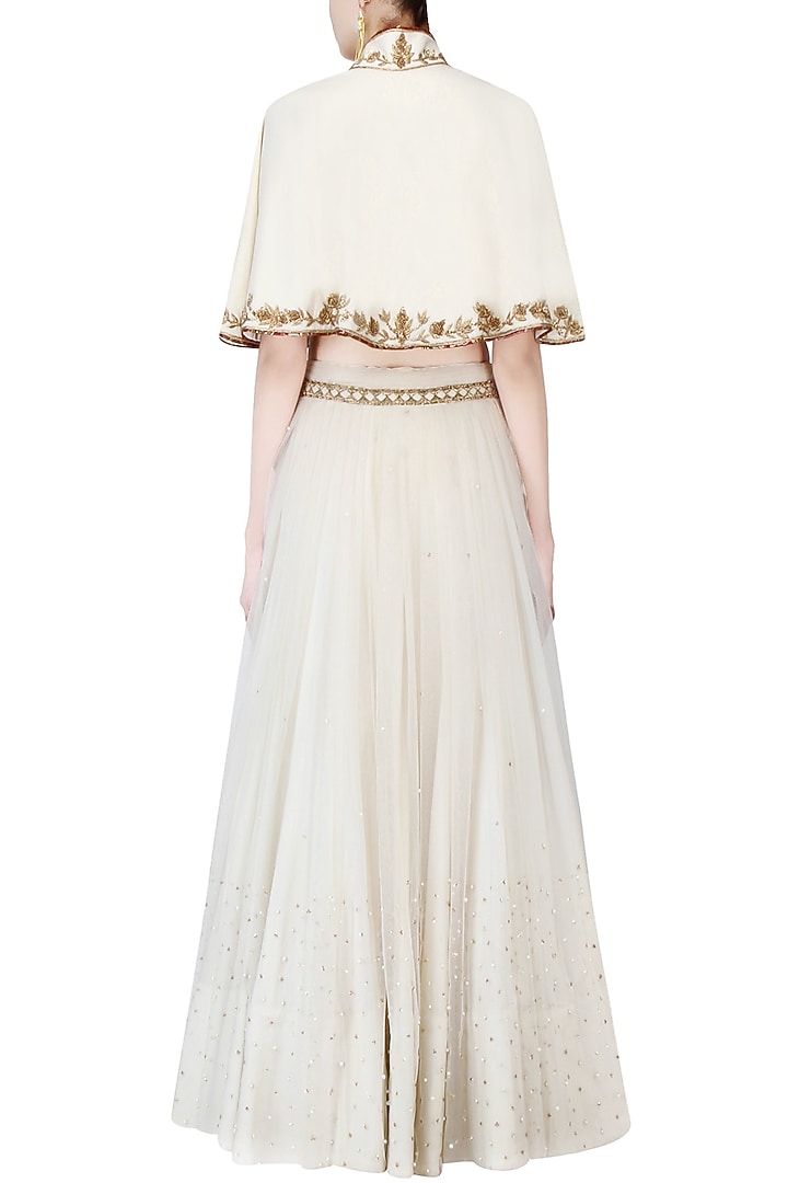 Vanilla color embroidered cape jacket with top and tulle skirt available only at Pernia's Pop Up Shop.