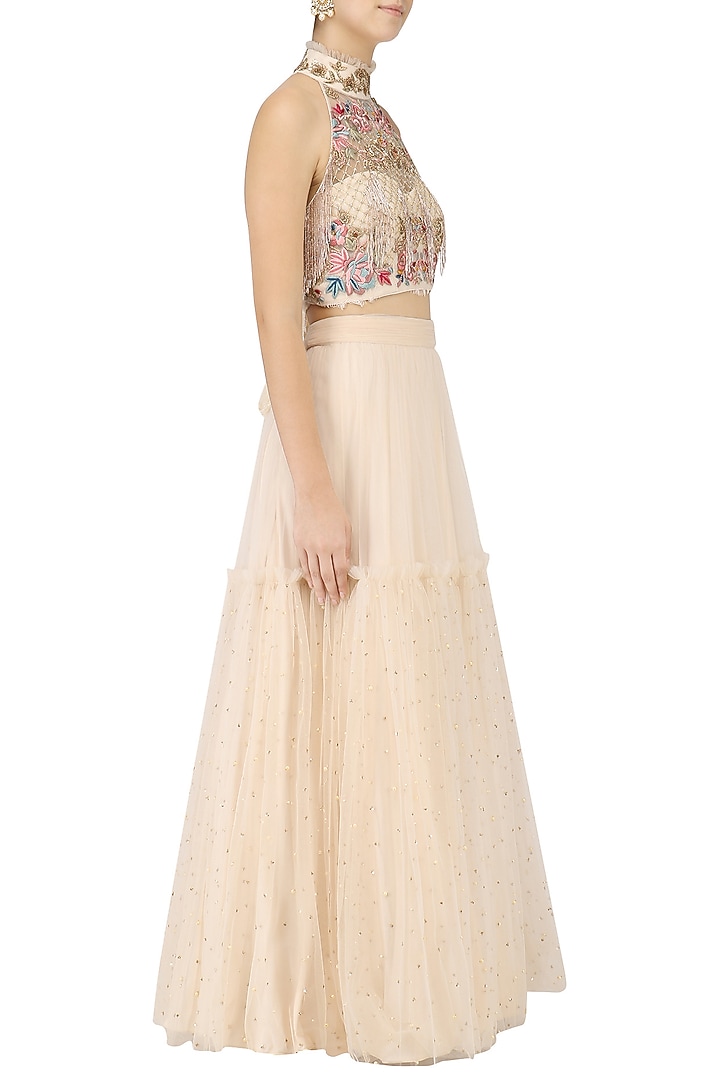 Ivory embroidered crop top with lehenga set available only at Pernia's Pop Up Shop.