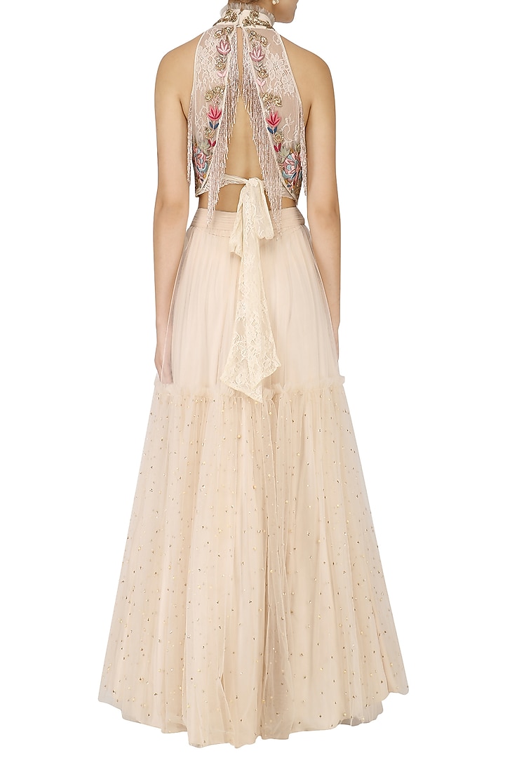 Ivory embroidered crop top with lehenga set available only at Pernia's Pop Up Shop.
