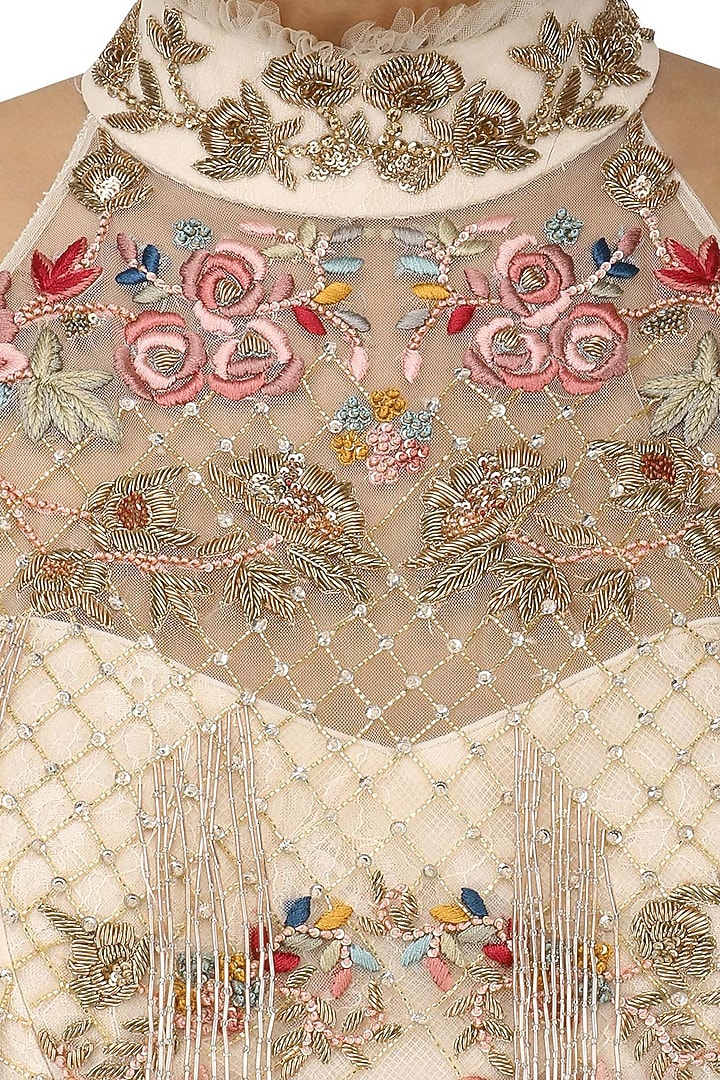 Ivory embroidered crop top with lehenga set available only at Pernia's Pop Up Shop.