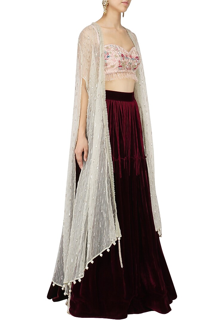 Pink floral embroidered blouse with wine lehenga set with cape available only at Pernia's Pop Up Shop.
