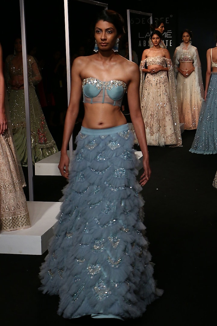 Frost Blue Ruffled Lehenga with Embroidered Cape and Corset by Monika Nidhii