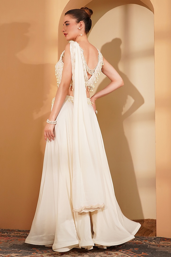 Ivory Crepe Party Wear Sharara Set by Milu Madan at Pernia's Pop Up Shop