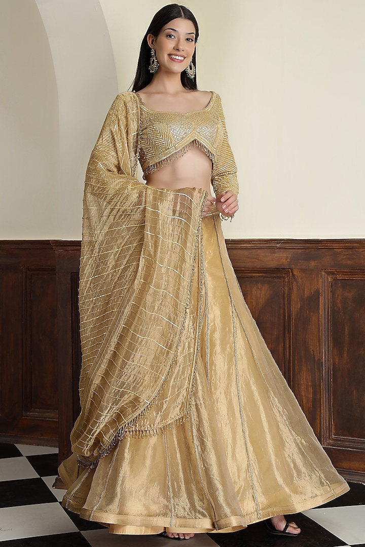 Gold Tissue Sequins & Cutdana Work Wedding Lehenga Set by Milu Madan at Pernia's Pop Up Shop