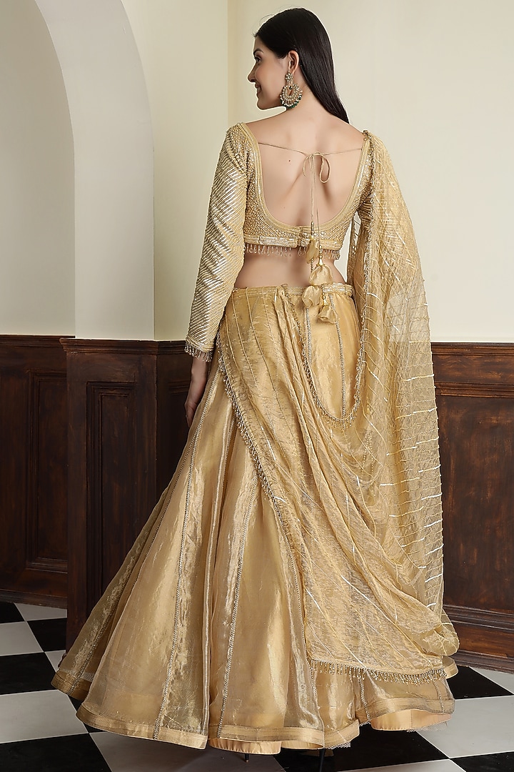 Gold Tissue Sequins & Cutdana Work Wedding Lehenga Set by Milu Madan at Pernia's Pop Up Shop
