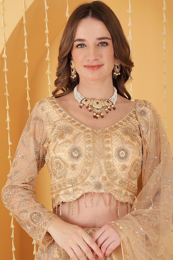 Gold Double Net Zari Hand Embroidered Wedding Lehenga Set by Milu Madan at Pernia's Pop Up Shop