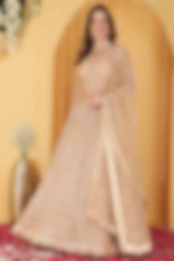 Beige Double Net Sequin Hand Embroidered Wedding Lehenga Set by Milu Madan at Pernia's Pop Up Shop