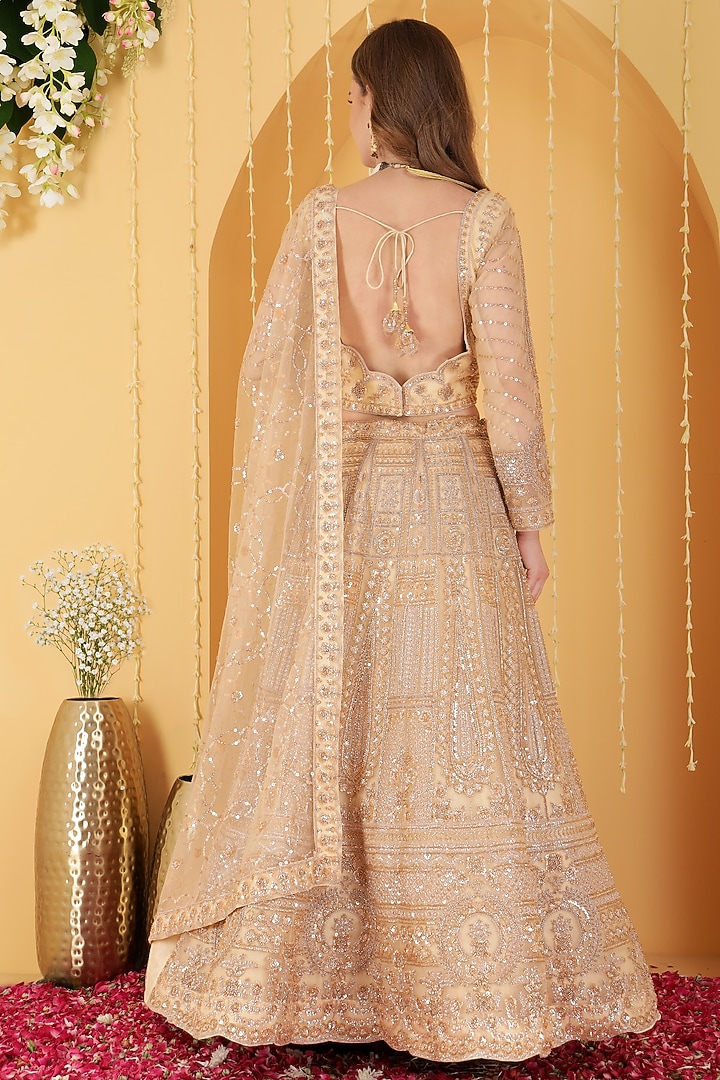 Beige Double Net Sequin Hand Embroidered Wedding Lehenga Set by Milu Madan at Pernia's Pop Up Shop